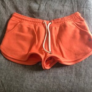 Orange / peach Hurley shorts